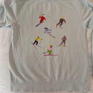 Living Fully - Christmas edition 2025 Light Blue Skiing Graphic Sweater- M